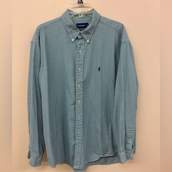 This listing is for two Ralph Lauren golf shirts.  Both are good shape.  Inv 13 - Picture 1 of 4